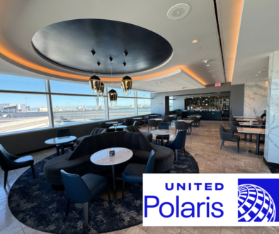 Seating area, snack bar, and views offered by the San Francisco United Polaris Lounge